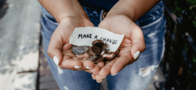 Hands holding coins